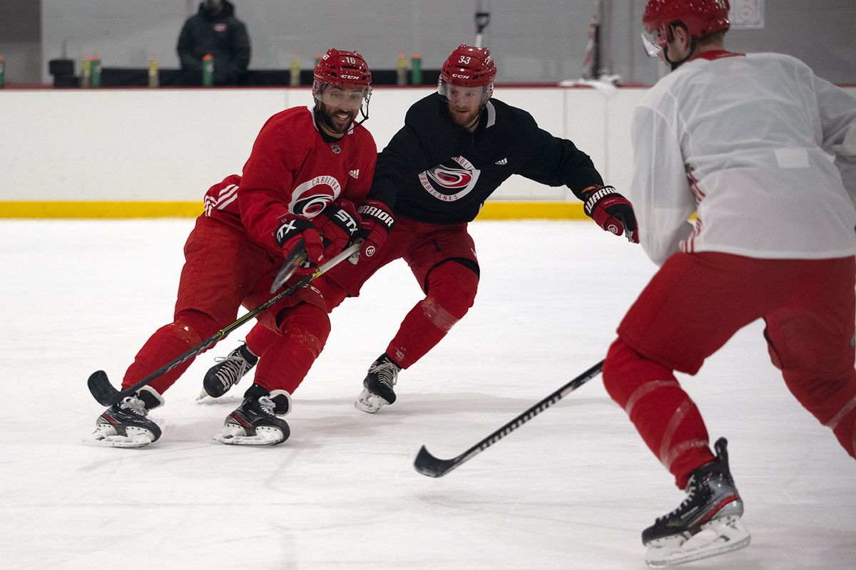Vincent Trocheck and Joakim Ryan vie for the puck during day three of training camp at Wake Competition Center, Jan. 6, 2021.