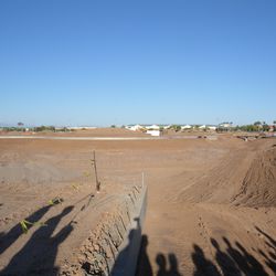 This will be a man-made lake; location is at east side of complex (Mesa Riverview in background)
