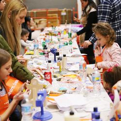 Three Jewish communities come together at the Home Depot for a menorah-building workshop in Salt Lake City on Sunday, Dec. 18, 2016.