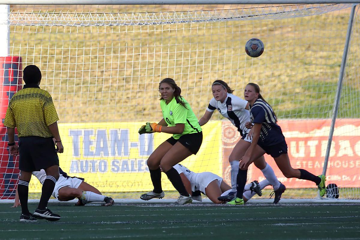 DSU freshman GK Felicity Tarr (center) and the Trailblazer defense turns away a Notre Dame de Namur scoring chance in a match played in St. George on Oct. 31.