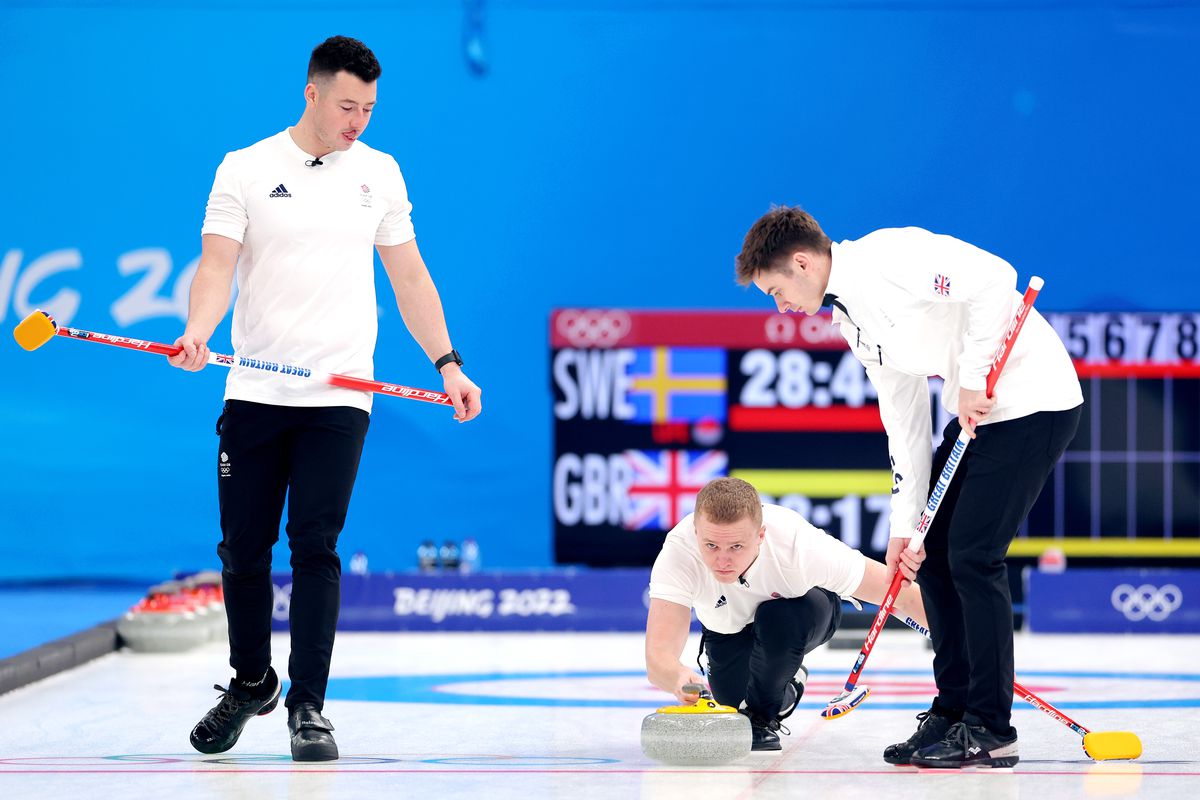 Hammy McMillan, Bobby Lammie and Grant Hardie of Team Great Britain compete against Team Sweden during the Men’s Curling Round Robin Session on Day 11 of the Beijing 2022 Winter Olympic Games at National Aquatics Centre on February 15, 2022 in Beijing, China.