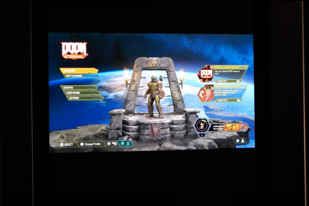 screenshot of a YouTube video showing Doom Eternal’s title screen on the door of a Samsung Family Hub Smart Refrigerator