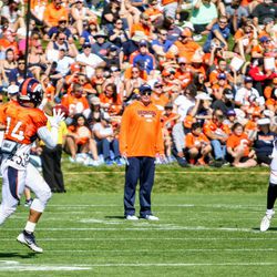 Wide receiver Cody Latimer catches a pass from Paxton Lynch during Broncos camp.