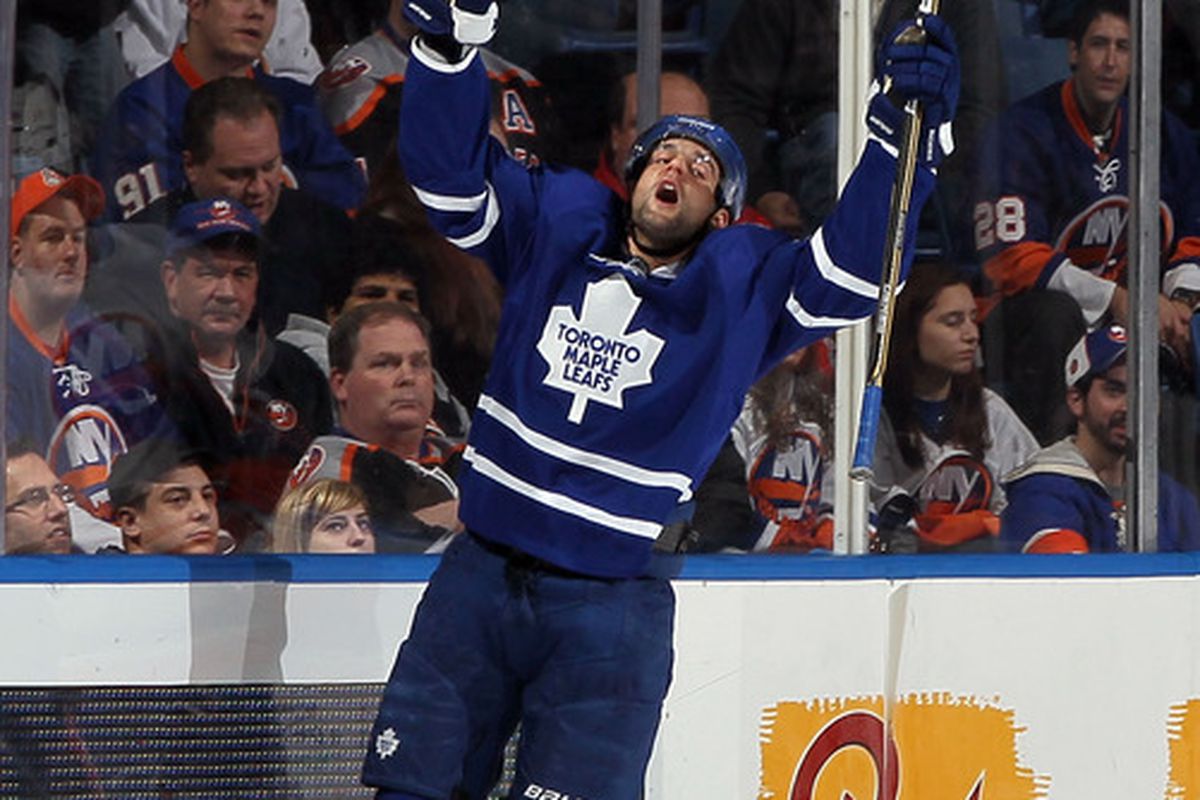 UNIONDALE, NY - JANUARY 24:  Clarke MacArthur #16 of the Toronto Maple Leafs celebrates his second-period goal against the New York Islanders on January 24, 2012 at Nassau Coliseum in Uniondale, New York.  (Photo by Jim McIsaac/Getty Images)