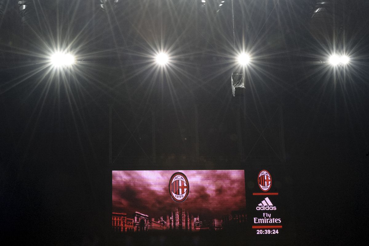 The logo of AC Milan is displayed on scoreboard of Giuseppe...