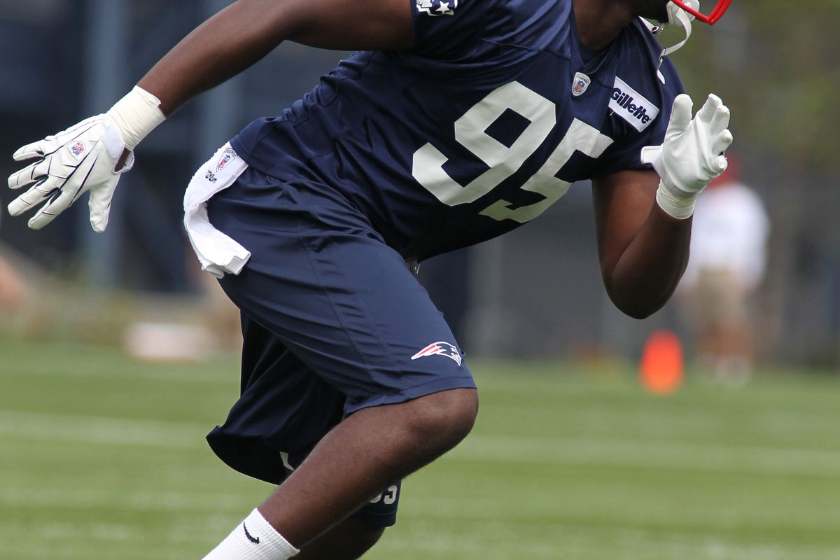 July 27, 2012; Foxborough, MA, USA; New England Patriots defensive end Chandler Jones runs through a drillduring training camp at the team practice facility. Mandatory Credit: Stew Milne-US PRESSWIRE