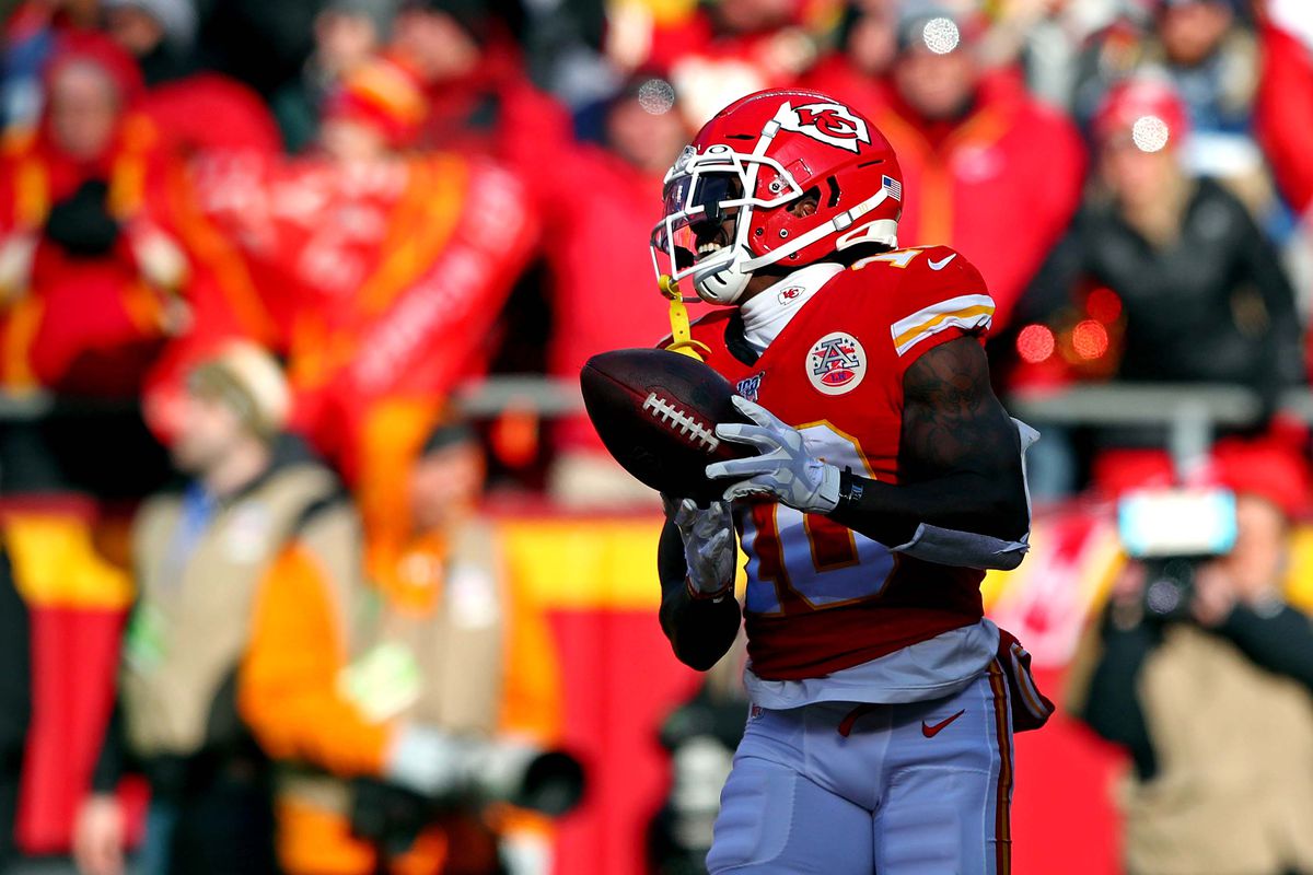 Kansas City Chiefs wide receiver Tyreek Hill reacts after scoring a touchdown during the second quarter against the Tennessee Titans in the AFC Championship Game at Arrowhead Stadium.