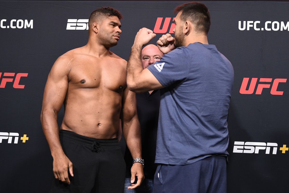 Opponents Alistair Overeem of the Netherlands and Augusto Sakai of Brazil face off during the UFC Fight Night weigh-in at UFC APEX on September 04, 2020 in Las Vegas, Nevada.