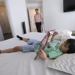 Ayan Patel, 6, reads as his father, Ashish Patel, talks to him at their home in Riverton on Tuesday, April 23, 2019. President Donald Trump has proposed eliminating 90,000 H-4 visas, which are typically issued to the spouses of H-1B holders. Ashish Patel has an H-1B visa and his immigration petition has been approved. His wife has an H-4 visa. Ayan is an American citizen. If his parents' immigration status changes and they need to return to India, Ayan does not have Indian citizenship.