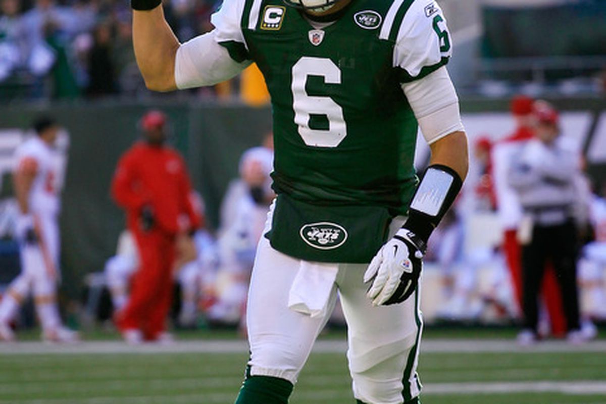 EAST RUTHERFORD, NJ - DECEMBER 11:  Mark Sanchez #6 of the New York Jets celebrates a touchdown against the Kansas City Chiefs at MetLife Stadium on December 11, 2011 in East Rutherford, New Jersey.  (Photo by Chris Trotman/Getty Images)