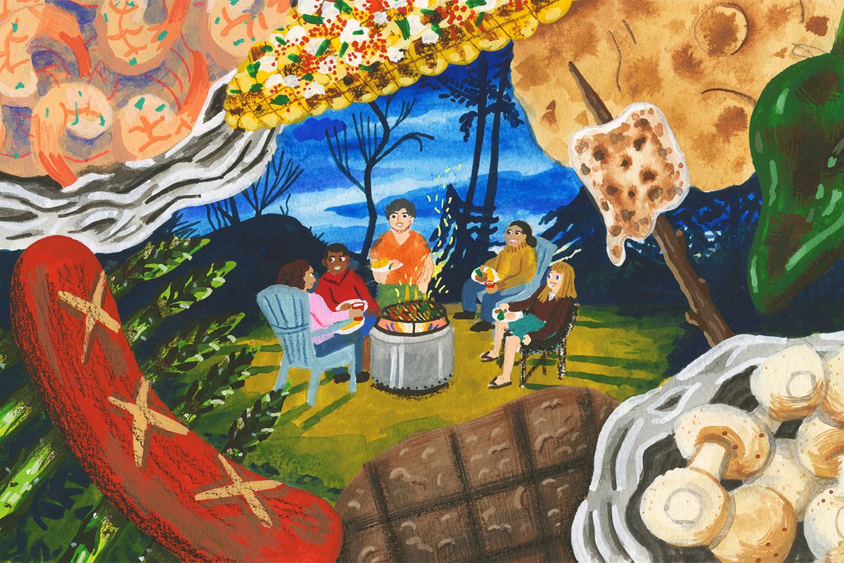 A group of people sits around a fire pit, framed in the foreground by corn on the cob, hot dogs, grilled shrimp and vegetables, and s’mores. Illustration.