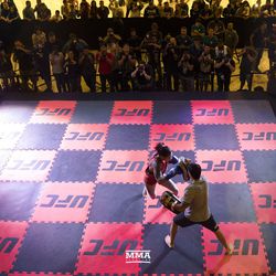 Amanda Nunes hits mitts at the UFC 224 open workouts Wednesday inside Barra Shopping Mall in Rio de Janeiro, Brazil.