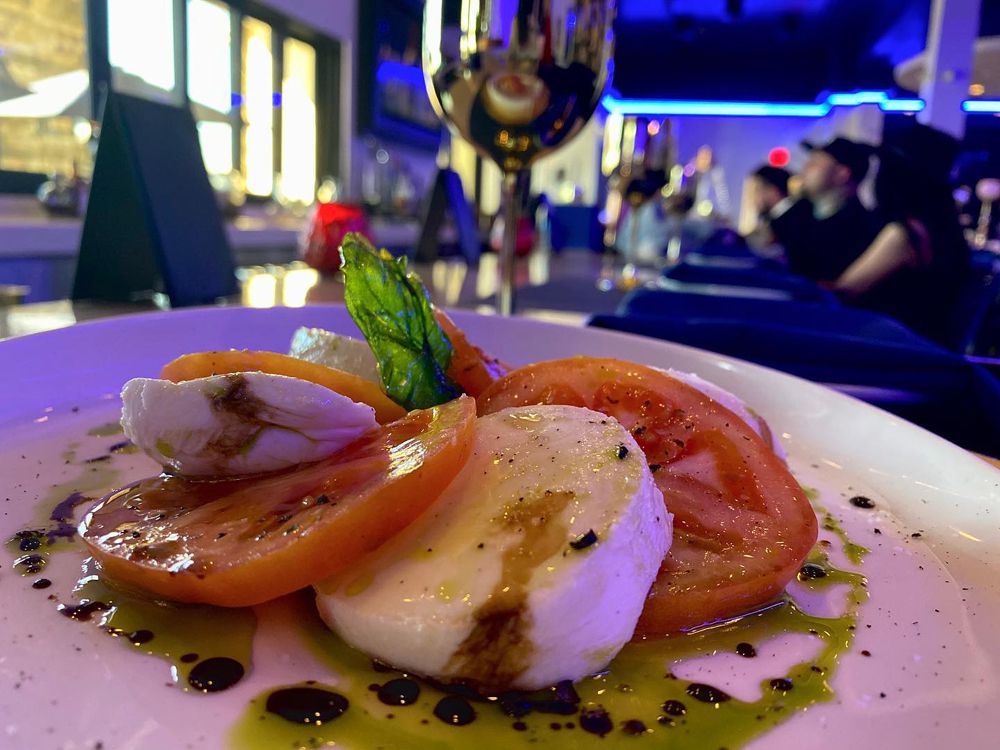 The caprese salad, now available on the dine at home lunch menu from Blume.