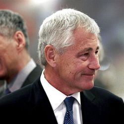 U.S. Defense Secretary Chuck Hagel, left, and Singapore's Prime Minister Lee Hsien Loong, left, attend the opening of the International Institute for Strategic Studies Shangri-la Dialogue, or IISS Asia Security Summit in Singapore, Friday, May 31, 2013. (AP Photo/Wong Maye-E)