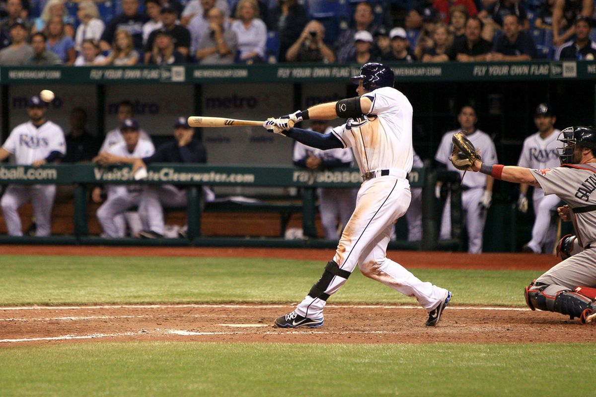 ST. PETERSBURG, FL - SEPTEMBER 10: Evan Longoria #3 of the Tampa Bay Rays hits the game winning run against the Boston Red Sox during the game on September 10, 2011 at Tropicana Field in St. Petersburg, Florida. (Photo by Steven Kovich/Getty Images)
