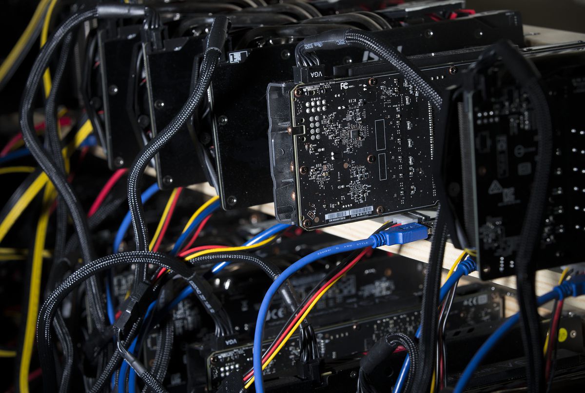 Jacob Berezay's Ethereum mining station is set up with 26 graphics cards in South Salt Lake on Thursday, Dec. 28, 2017.