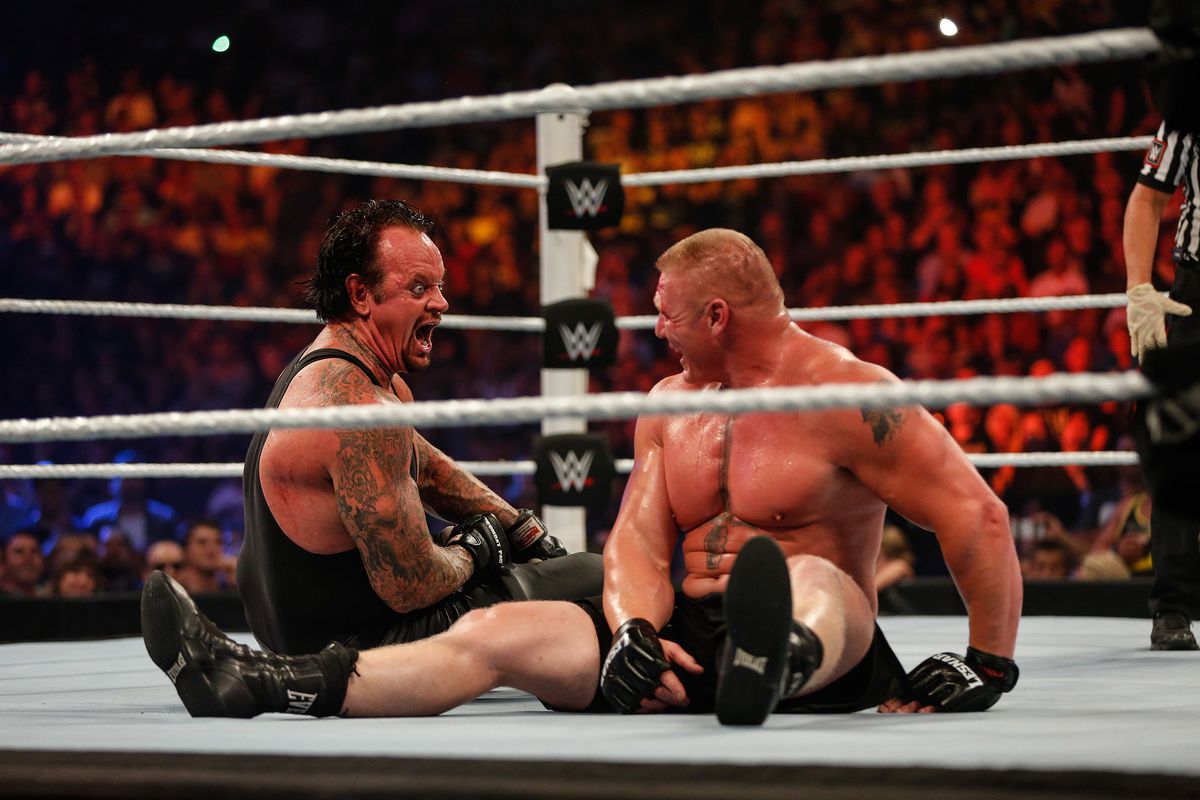 Brock Lesnar and The Undertaker battle it out at the WWE SummerSlam 2015 at Barclays Center of Brooklyn on August 23, 2015 in New York City.