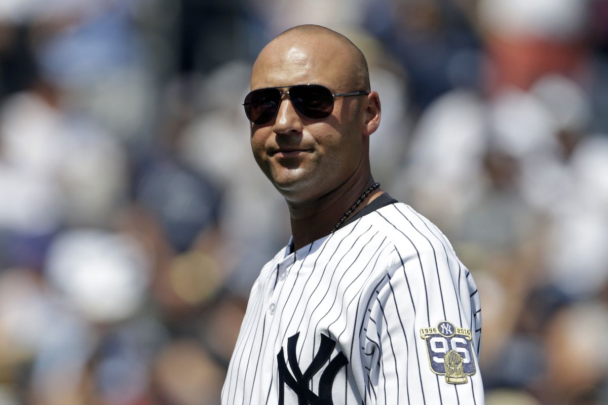 Former New York Yankees Derek Jeter leaves the field following a ceremony for the reunion of the 1996 World Series Championship Team prior to a game against the Tampa Bay Rays at Yankee Stadium.