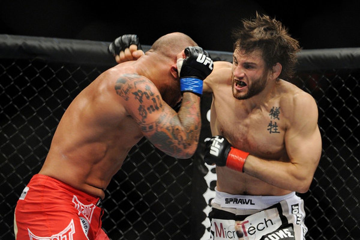 OAKLAND CA - AUGUST 07:  Jon Fitch punches Thiago Alves during the UFC Welterweight bout at Oracle Arena on August 7 2010 in Oakland California.  (Photo by Jon Kopaloff/Zuffa LLC/Zuffa LLC via Getty Images)
