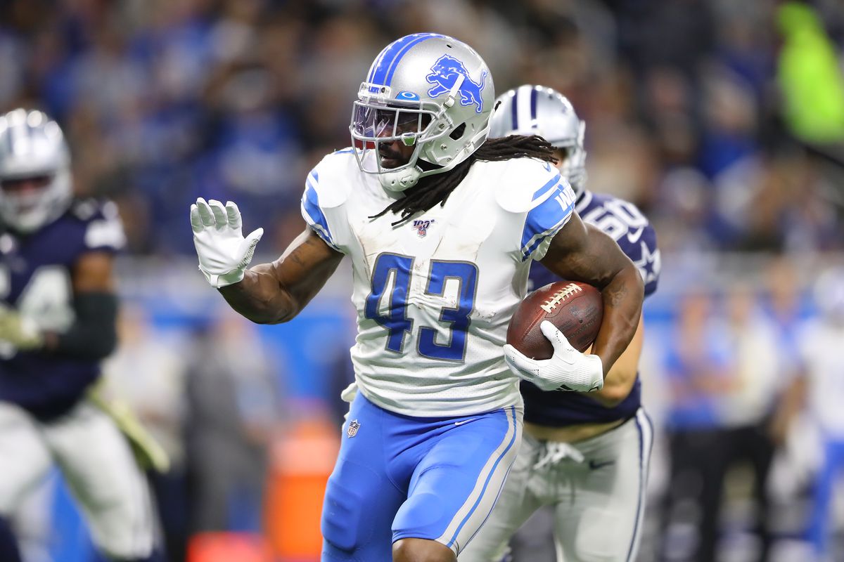 Bo Scarbrough of the Detroit Lions runs the ball for the first down in the second quarter against the Dallas Cowboys at Ford Field on November 17, 2019 in Detroit, Michigan.
