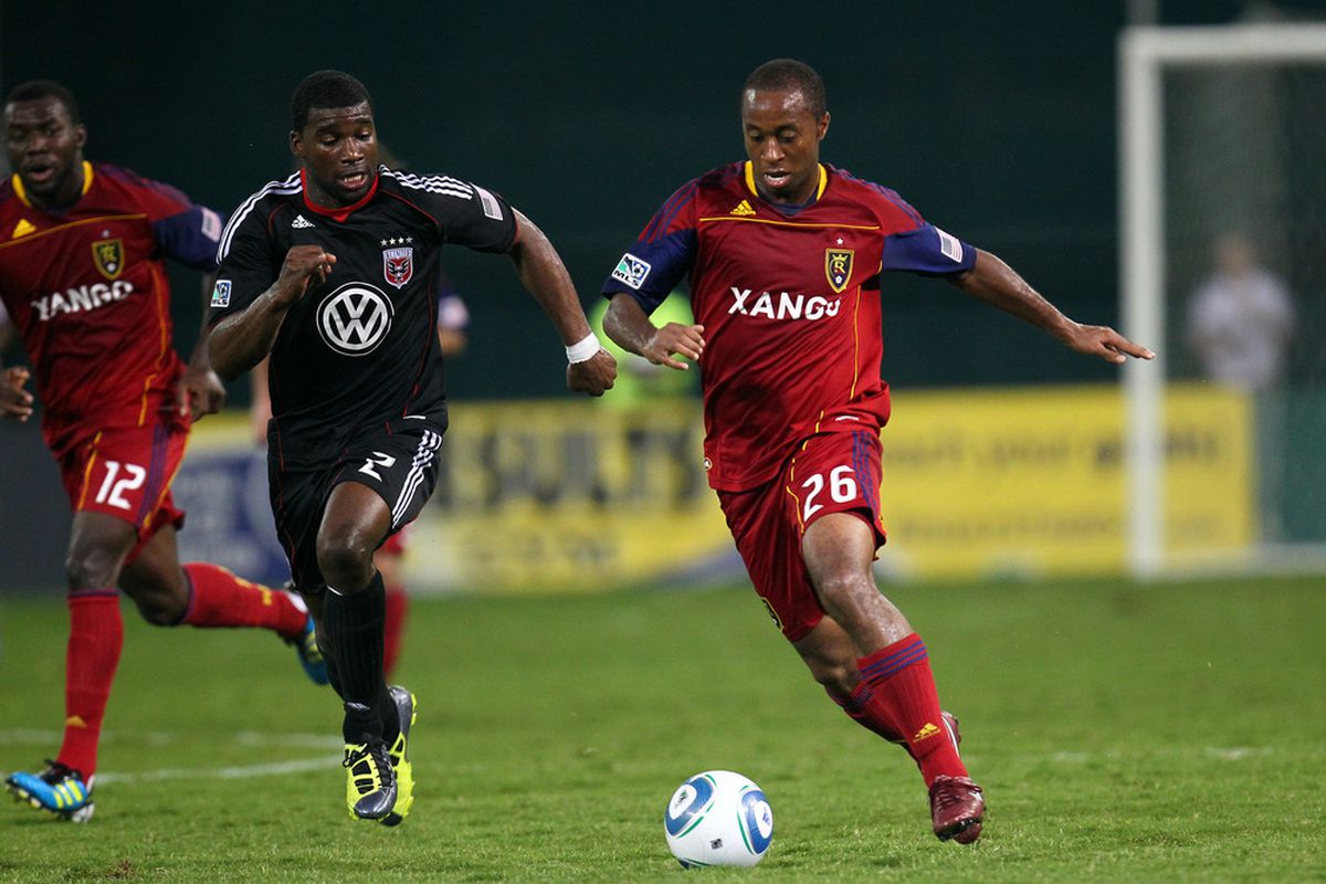 WASHINGTON, DC - SEPTEMBER 24: Collen Warner #26 of Real Salt Lake controls the ball against Brandon McDonald #2 of D.C. United at RFK Stadium on September 24, 2011 in Washington, DC. (Photo by Ned Dishman/Getty Images)