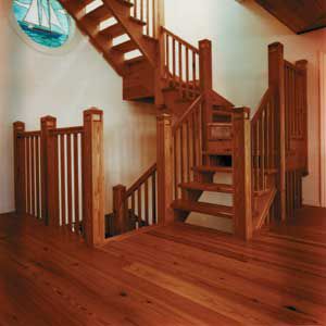 <p>Exotic and antique wood floors from smaller companies are other options to consider. Most of these suppliers specialize in certain types of flooring—wide planks or floor boards made from salvaged timber, for example. Seen here are Santos mahogany flooring from Indusparquet and antique-pine wide planks from Goodwin Heart Pine Company.</p>