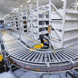 Containers of medical supplies move on a conveyor belt in Intermountain Health Care's Kem C. Gardner Supply Chain Center in Midvale on Tuesday, Aug. 29, 2017. The high-tech center helps Utah medical facilities be more prepared for natural disasters like Hurricane Harvey, which battered Texas.