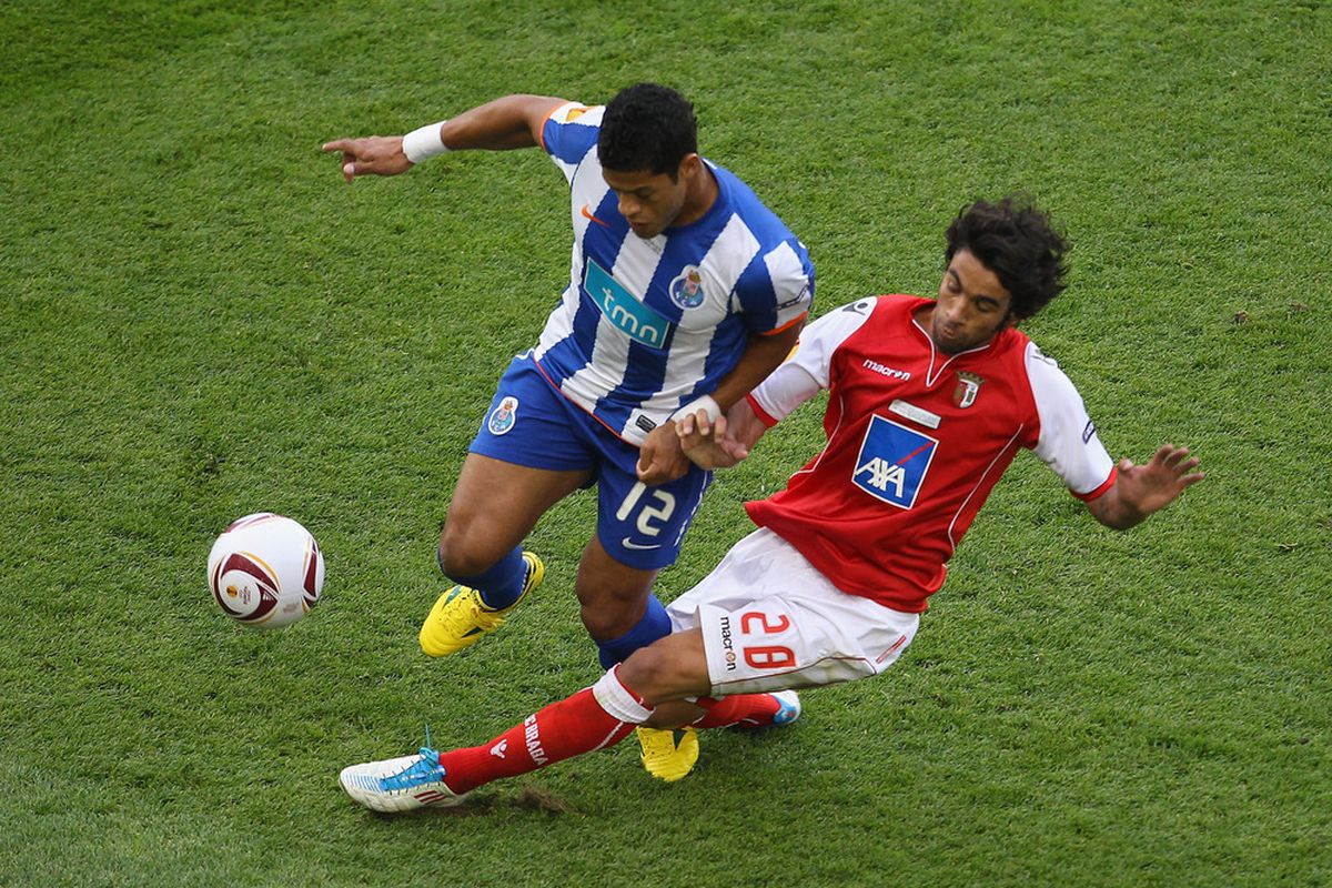 DUBLIN, IRELAND - MAY 18:  Hulk of FC Porto is tackled by Silvio of SC Braga during the UEFA Europa League Final between FC Porto and SC Braga at Dublin Arena on May 18, 2011 in Dublin, Ireland.  (Photo by Julian Finney/Getty Images)