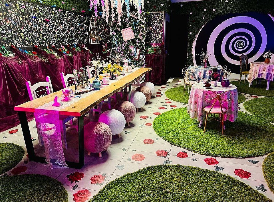 A room decorated with “Alice in Wonderland” decorations
