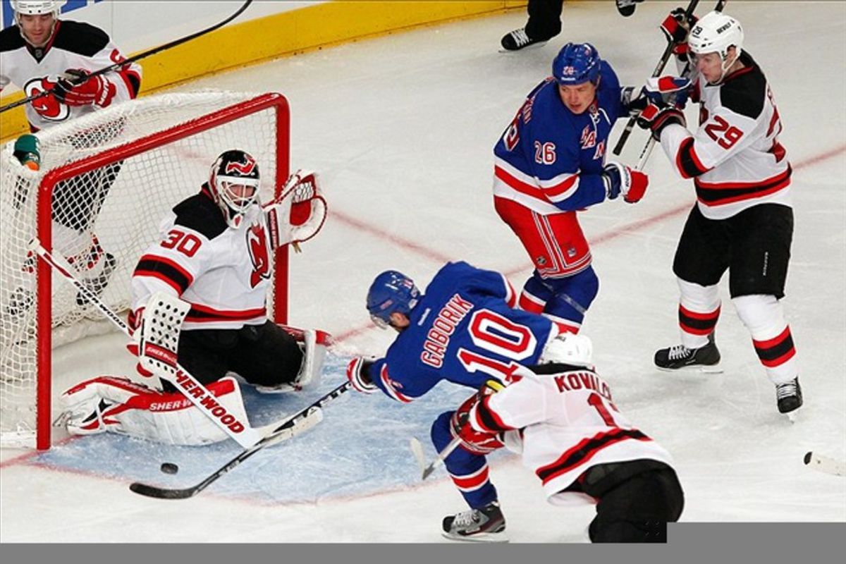 Feb. 27, 2012; New York, NY, USA; New York Rangers right wing Marian Gaborik (10) shoots on New Jersey Devils goalie Martin Brodeur (30) during the third period at Madison Square Garden. Rangers won 2-0. Debby Wong-US PRESSWIRE