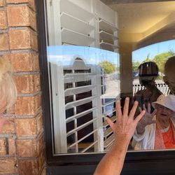 Family members of Jenny Allred, of Lehi, try to connect with their 95-year-old mother and grandmother, Annie, during the COVID-19 pandemic when they were not allowed inside the long-term care facility.
