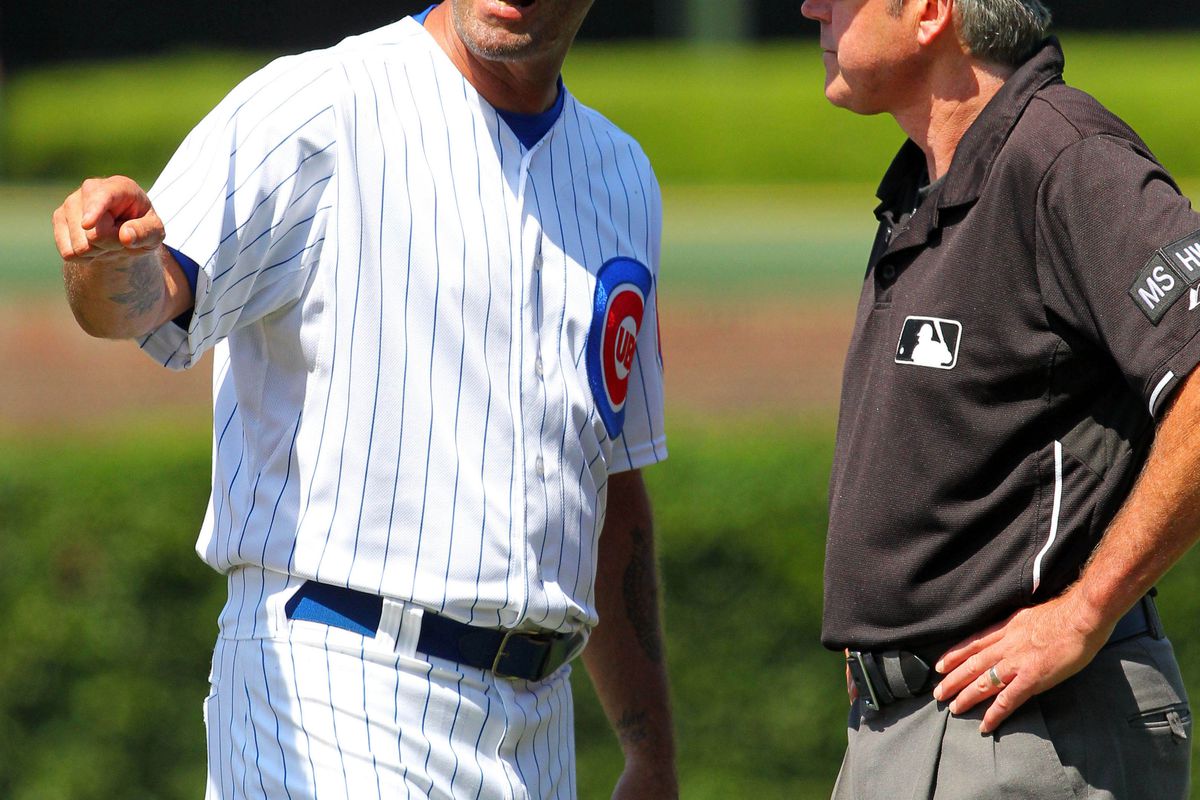 Chicago, IL, USA; Chicago Cubs manager Dale Sveum argues with first base umpire Mike Winters against the St. Louis Cardinals at Wrigley Field. Sveum was ejected. Credit: Dennis Wierzbicki-US PRESSWIRE