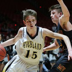 Highland's Rick Schmidt spins around Mountain View's Brigham Bateman in Class 4A quarterfinal basketball action in the Huntsman Center at the University of Utah Wednesday, March 2, 2016. Highland beat Mountain View 76-64.