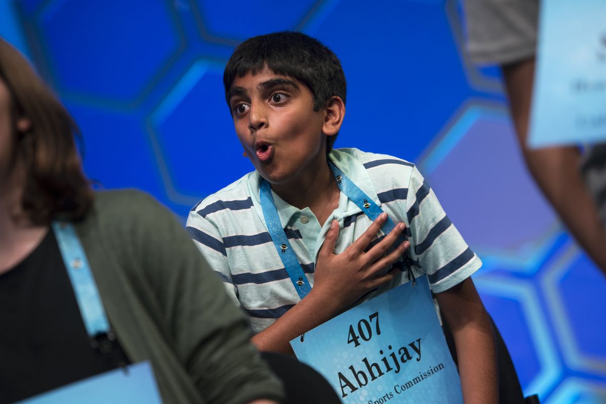 Abhijay Kodali, 12, of Flower Mound, Texas reacts as one of the spellers attempts his word during the finals the Scripps National Spelling Bee on Thursday May 30, 2019 in Oxon Hill, Md.