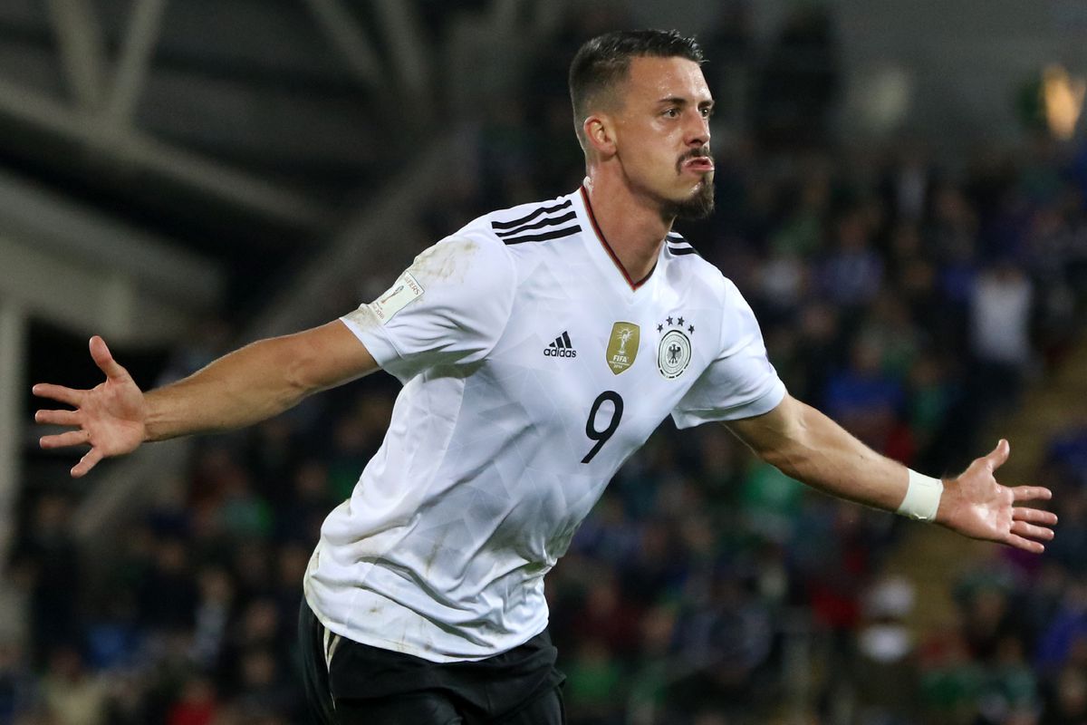 Germany's striker Sandro Wagner celebrates after scoring their second goal during the FIFA World Cup 2018 qualification football match between Northern Ireland and Germany at the National Football Stadium at Windsor Park in Belfast on October 5, 2017.