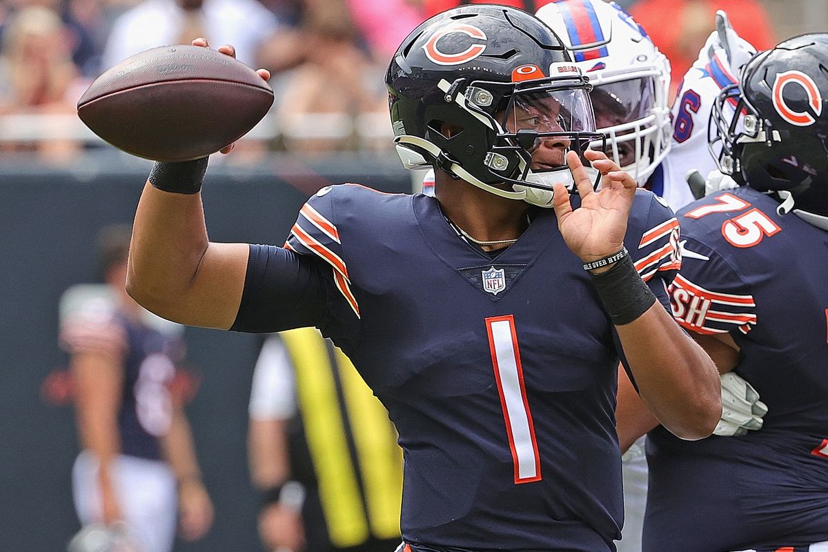 Justin Fields #1 of the Chicago Bears passes against the Buffalo Bills during a preseason game at Soldier Field on August 21, 2021 in Chicago, Illinois. The Bills defeated the Bears 41-15.