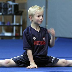 Clay Whiffen, 8, once diagnosed as autistic, works out at Lehi Legacy Center. 