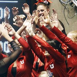 Utah's team cheers for Kailah Delaney after her vault at the NCAA Salt Lake Regional Gymnastics Saturday, April 7, 2012 in Salt Lake City. 