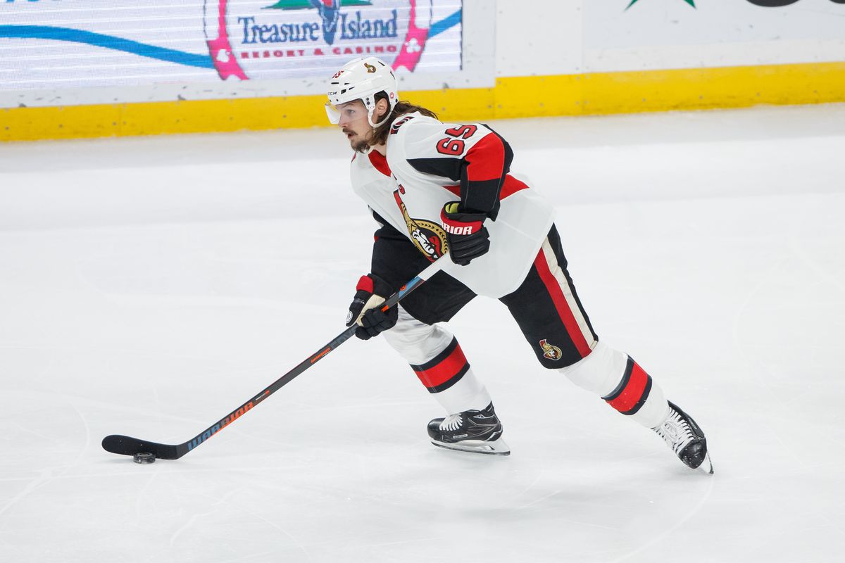 Jan 22, 2018; Saint Paul, MN, USA; Ottawa Senators defenseman Erik Karlsson (65) skates with the puck in the second period against the Minnesota Wild at Xcel Energy Center.