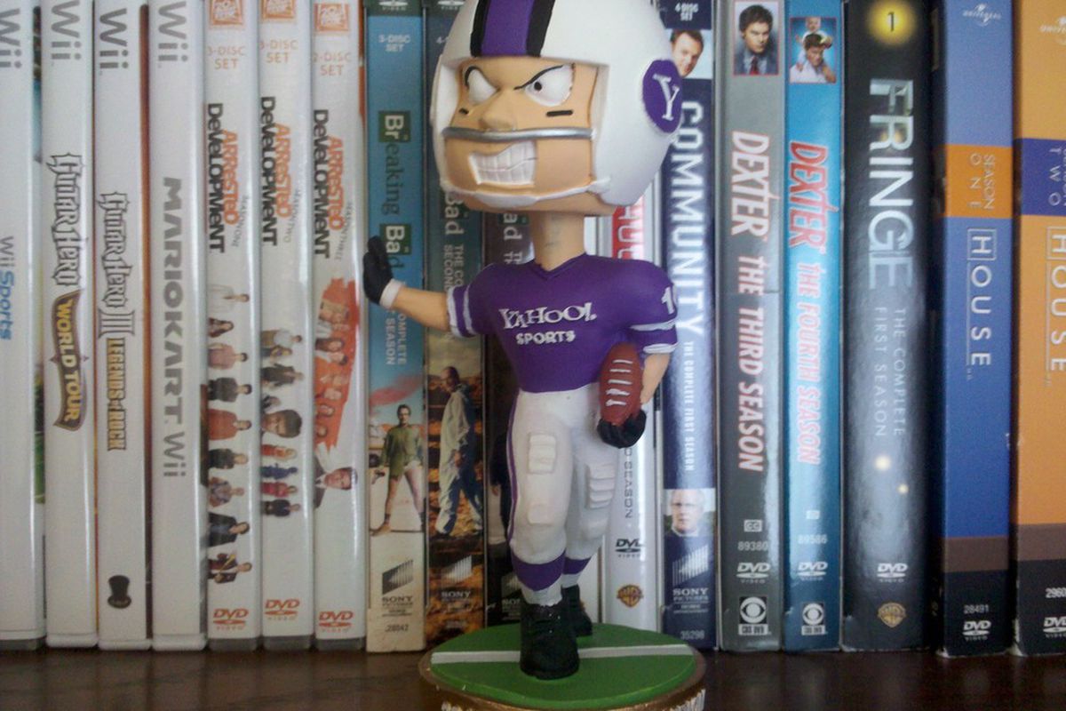 This time next year, this Yahoo! Fantasy Football championship bobblehead won't be flying solo on my bookshelf.