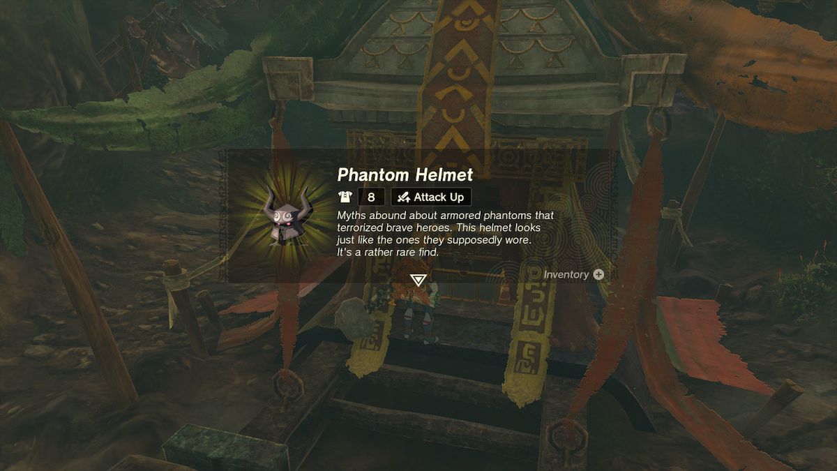 Link opens a chest containing the phantom helmet of the phantom armor set in Zelda Tears of the Kingdom.