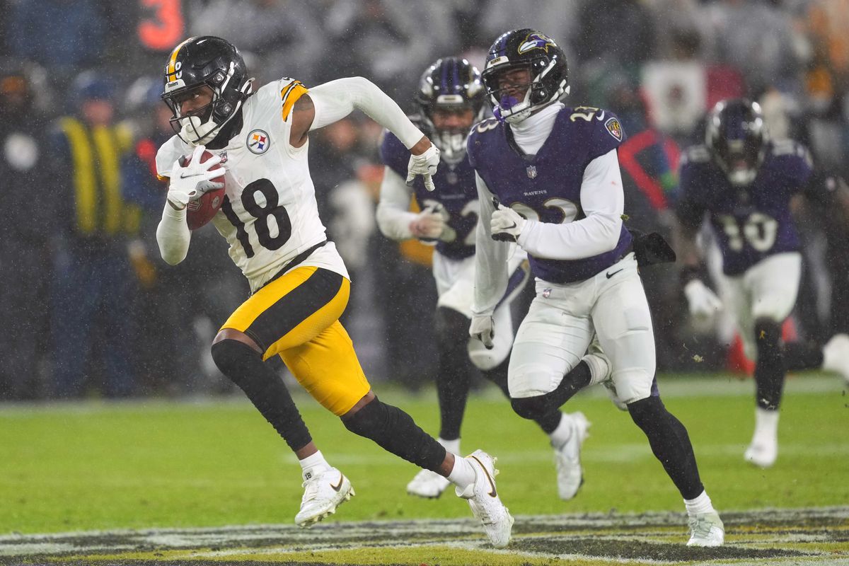 Pittsburgh Steelers wide receiver Deontae Johnson (18) runs for a fourth quarter touchdown following his catch defended by Baltimore Ravens cornerback Rock Ya-Sin (23) at M&amp;amp;T Bank Stadium.