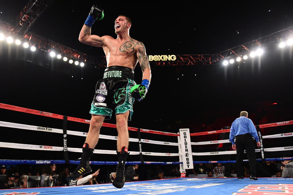 Joe Smith Jr. reacts after punching Bernard Hopkins out of the ring for a ninth round TKO to win the WBC International Light Heavyweight title at The Forum on December 17, 2016 in Inglewood, California.