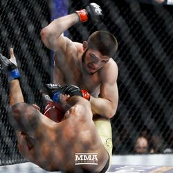 Khabib Nurmagomedov pounds Edson Barboza at UFC 219.