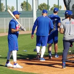 Addison Russell (with bat), Darnell McDonald ("In Blue Out Red" shirt) -
