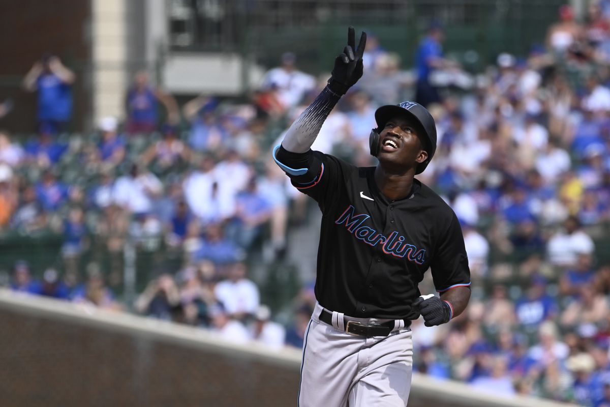 Miami Marlins right fielder Jesus Sanchez (76) reacts after hitting a home run against the Chicago Cubs during the seventh inning at Wrigley Field