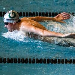 Olympus’ Evan VanBrocklin swims to a win the 100-yard butterfly at the 5A boys swimming state meet at the Wasatch Aquatic Center in Heber City on Saturday, Feb. 20, 2021.