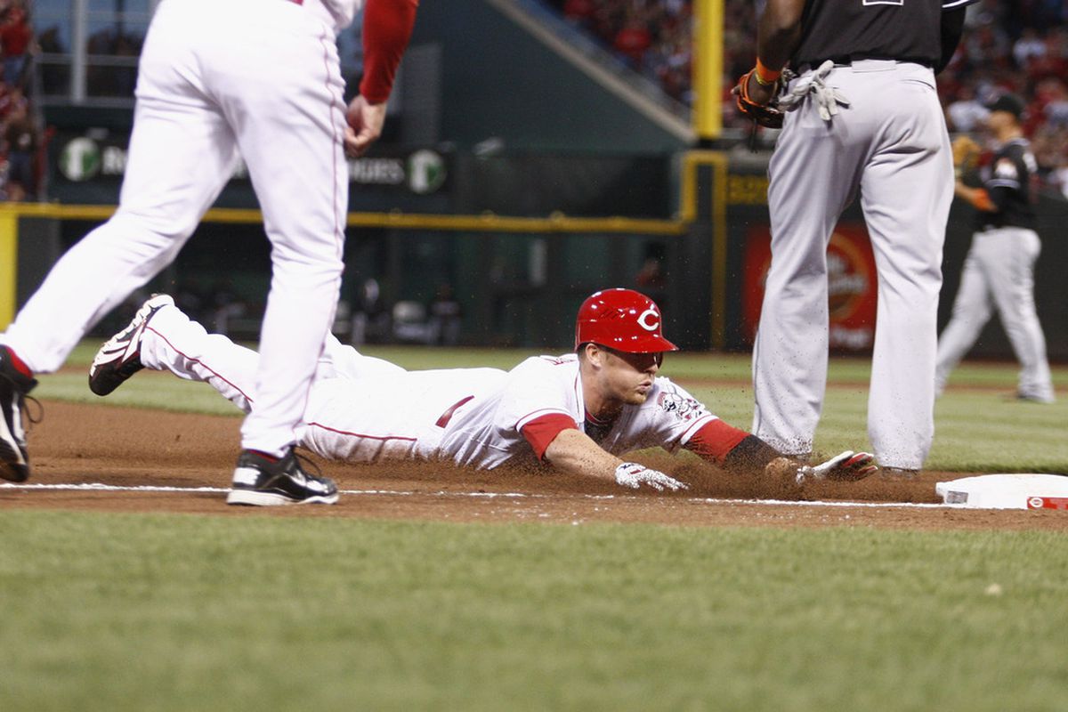 Is Cozy the first Red of the Week in his first week as Reds starting shortstop?  (Photo by John Grieshop/Getty Images)