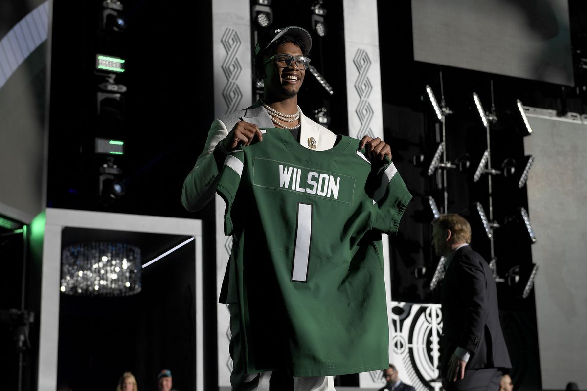 Garrett Wilson poses onstage after being selected tenth by the New York Jets during round one of the 2022 NFL Draft on April 28, 2022 in Las Vegas, Nevada.