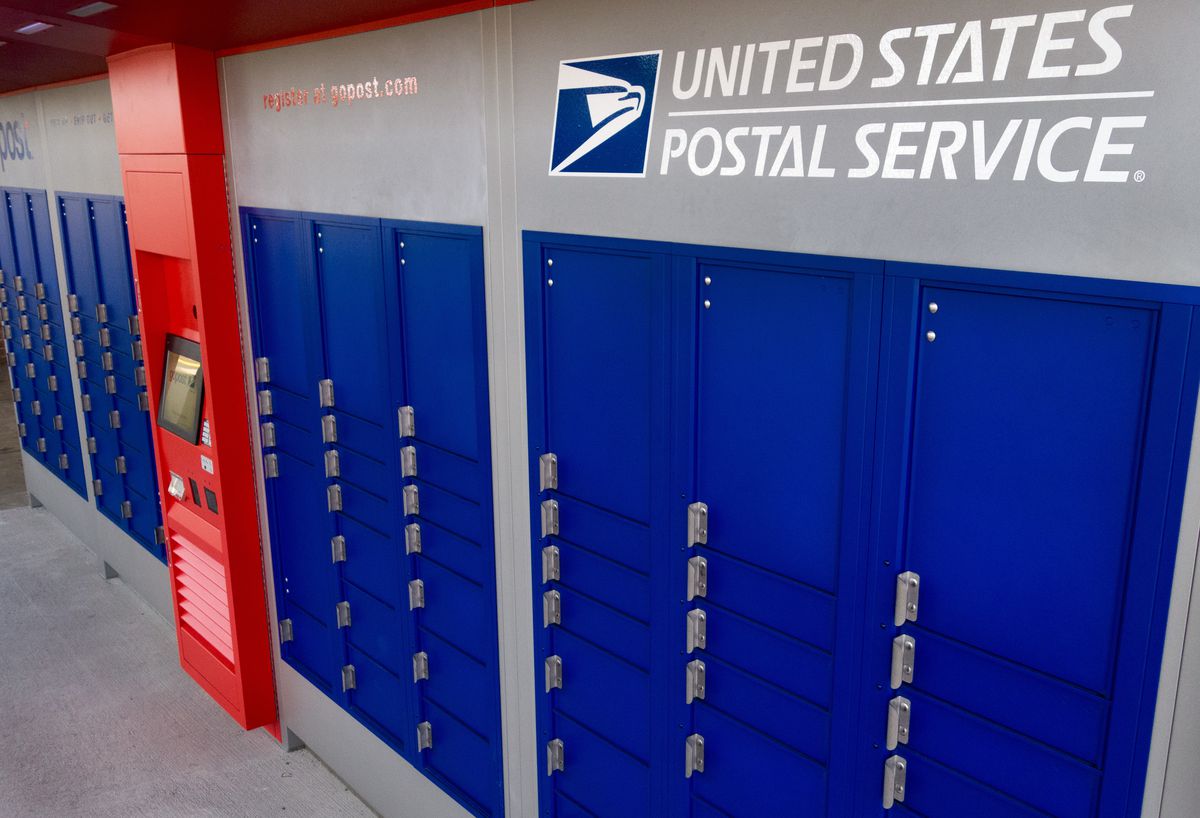 A new and improved colorful outdoor version of Post Office mail boxes are seen outside the Centerville, Virginia, US Post Office September 26, 2013. AFP PHOTO/Paul J. Richards        (Photo credit should read PAUL J. RICHARDS/AFP/Getty Images)